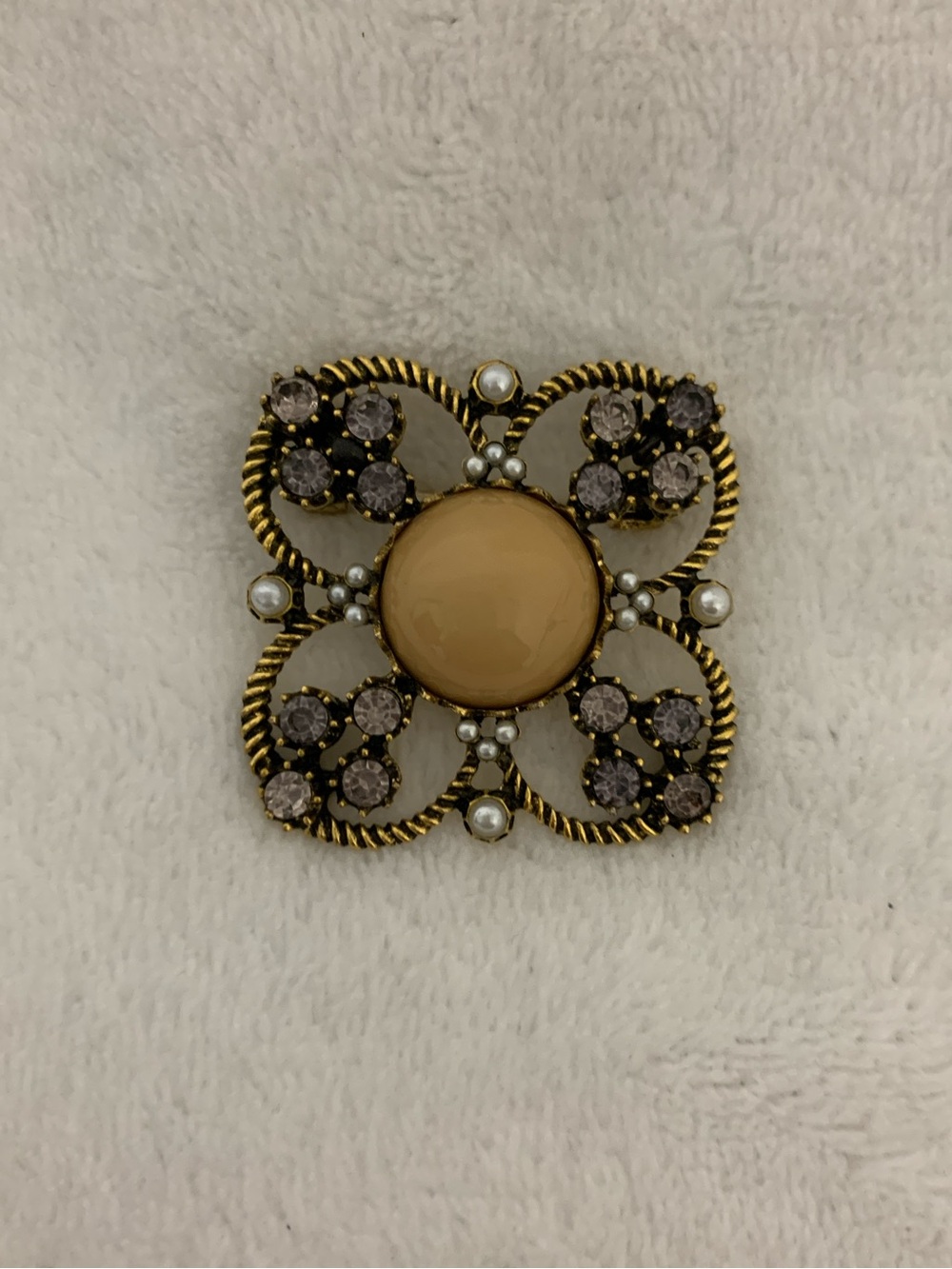 Gold-Tone Floral Brooch with Beige Center